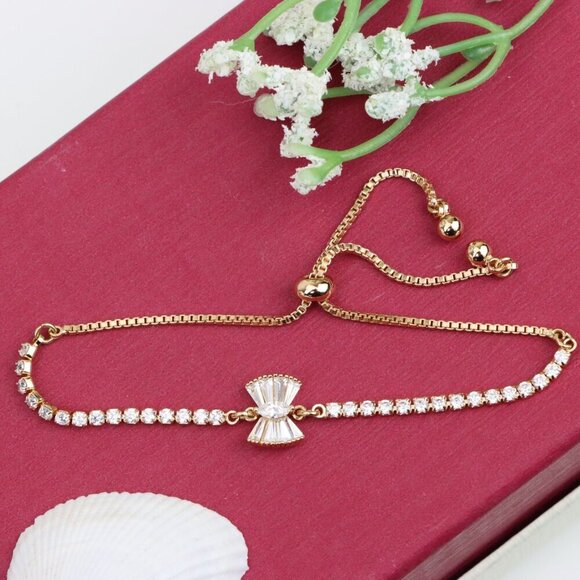 "Elegant Rose Gold Bow Charm Adjustable Bracelet with CZ Stones, XPAB0834 - Picture 1 of 12